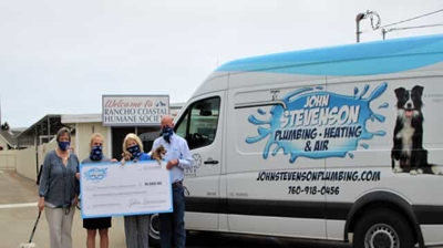Check from John Stevenson to Rancho Coastal Humane Society Photo