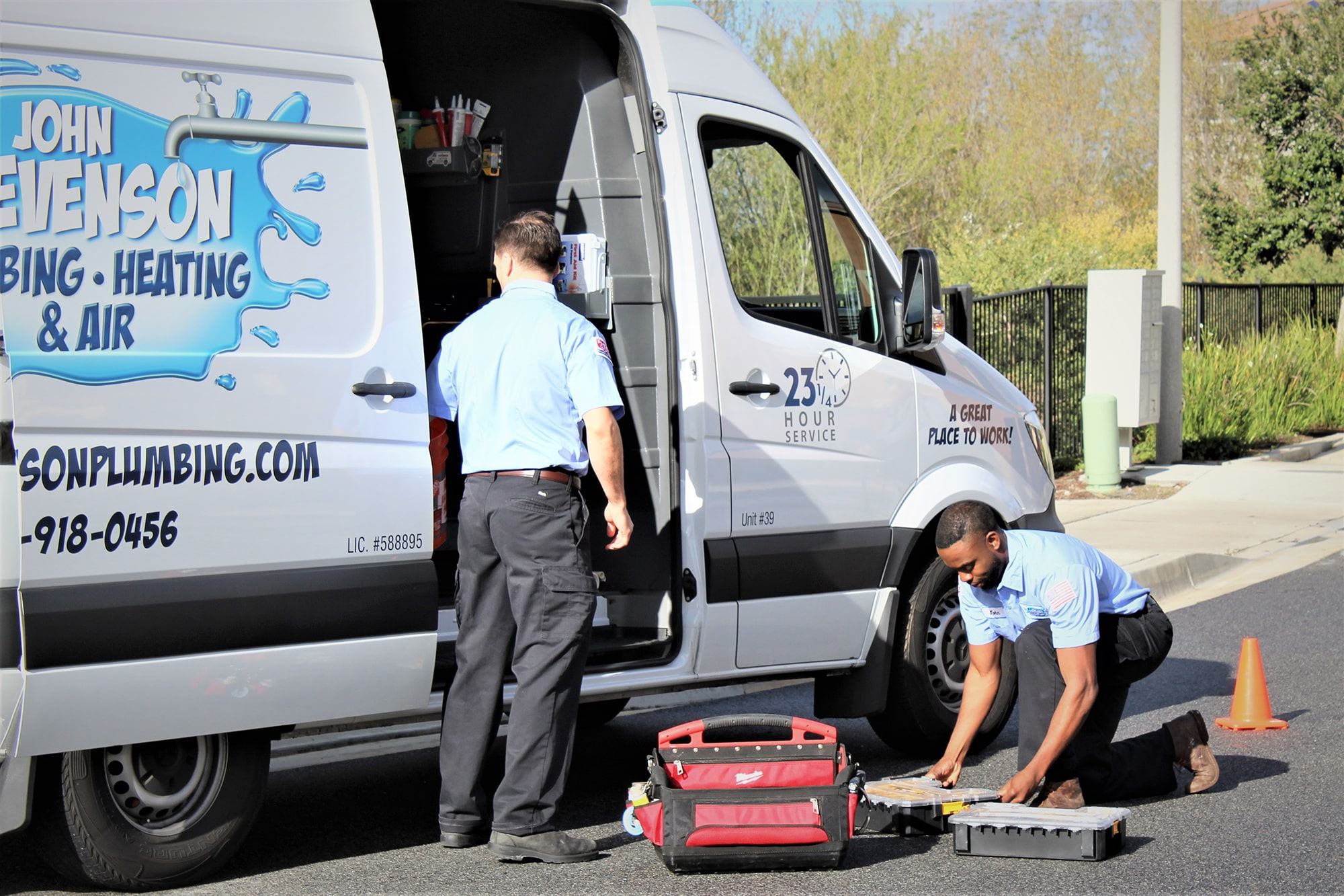 John Stevenson techs taking tools out of van